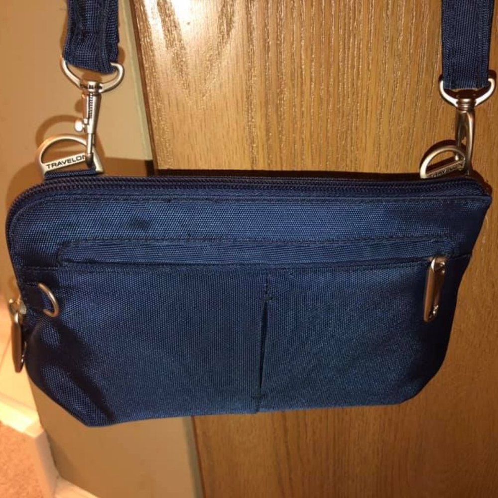 Travelon Anti-Theft Classic Convertible Crossbody and Wasitpack purse blue color